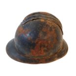 A WW2 french steel helmet. Provenance: Submitted b