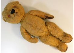 A mid 20thC. Merrythought teddy bear, growler faul