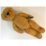 A mid 20thC. Merrythought teddy bear, growler faul