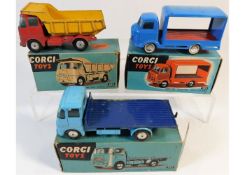 Three boxed Corgi diecast vehicles: Earth dumper 4