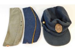 A German field hat & two German berets. Provenance