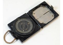 A bakelite compass T. G. & Co. a/f. Provenance: Su