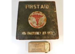 A WW2 US army first aid tin & one packaged bandage