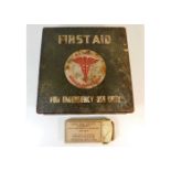 A WW2 US army first aid tin & one packaged bandage