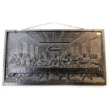 A 19thC. cast iron plaque of Jesus "The Last Suppe