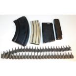 Four gun magazines: .303 Bren gun; .556 Colt Armal