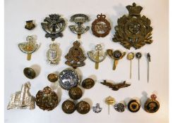 A quantity of mixed military badges including Wome