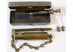 A WW1 hypodermic morphine needle kit twinned with