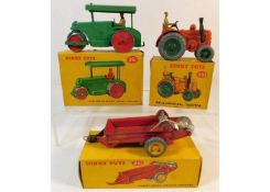 Three boxed Dinky diecast toy vehicles: Field-Mars