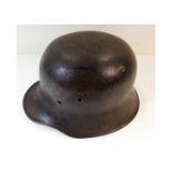 A WW1 M16 German helmet. Provenance: Submitted by