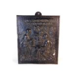 A 19thC. cast iron plaque of religious interest 14