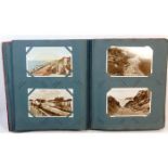 A vintage postcard album, mostly topographical app