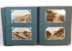 A vintage postcard album, mostly topographical app