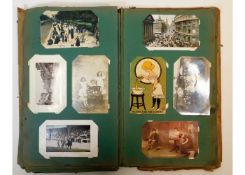 A vintage early 20thC. postcard album, approx. 272