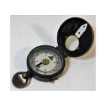 A WW1 military compass inscribed Ronald Mosley Ast