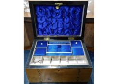 A Victorian inlaid ladies work box with upholstere