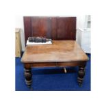 A substantial Victorian mahogany extending table w