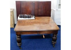 A substantial Victorian mahogany extending table w