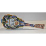 A late 19thC. French faience mandolin 16in long