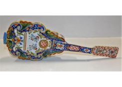 A late 19thC. French faience mandolin 16in long