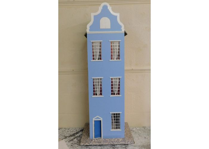 A large Dutch style dolls house 45in high x 14in w