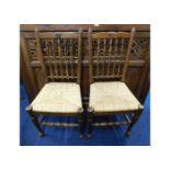 A pair of Brights of Nettlebed oak rush seat chair