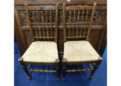 A pair of Brights of Nettlebed oak rush seat chair