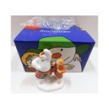 A boxed Coalport porcelain The Snowman 5.75in tall
