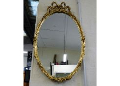 A decorative modern Regency style gilt framed mirr