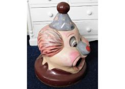 A large circus /theme park bin top in the form of an clown 33in high