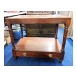 An Edwardian mahogany console table with drawer un