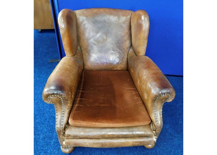 An early/mid 20thC. leather arm chair a/f