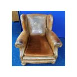 An early/mid 20thC. leather arm chair a/f