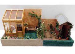 A dolls house model conservatory & garden includin