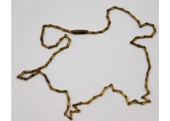 A 1920's 15ct gold necklace 7.6g 17in long