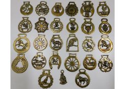 A quantity of 26 horse brasses & one other