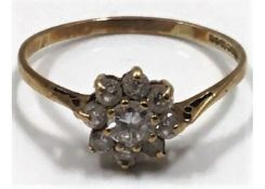 A 9ct gold ring with paste stones 1.4g