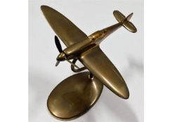 A brass Hurricane desk model, wingspan 8.5in