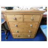 A Victorian stripped pine chest of drawers 37.5in