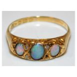 An 18ct gold ring set with opal & diamond a/f with