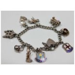 A silver charm bracelet 29.5g 7in long