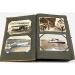A vintage postcard album, mostly greetings cards a