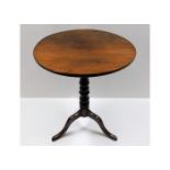 A 19thC. mahogany tilt top occasional table 26in h