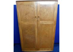 A vintage retro Ercol elm double wardrobe with int