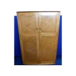 A vintage retro Ercol elm double wardrobe with int