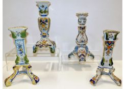 Four French faience candle holders, tallest 9.75in