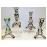 Four French faience candle holders, tallest 9.75in