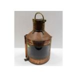 A large copper ships lantern with brass label "Bow