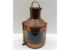 A large copper ships lantern with brass label "Bow