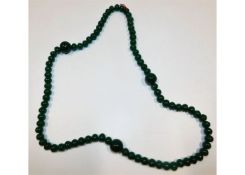 A jade necklace 220g 34in long